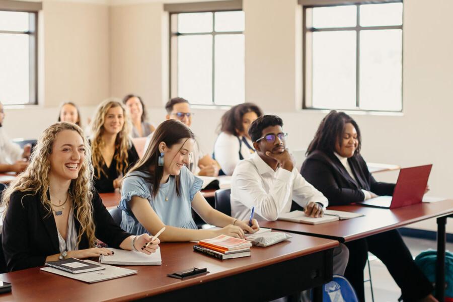 PBA students attend a classroom lecture.